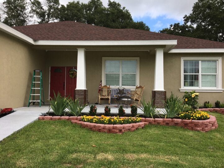 A front porch columns and posts project using GenStone's faux stone.