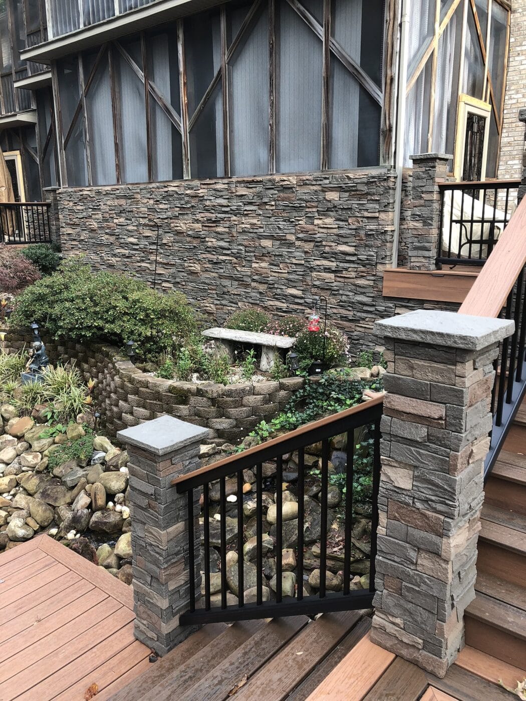 A DIY backyard pond and waterfall using our Stratford Stacked Stone panels.