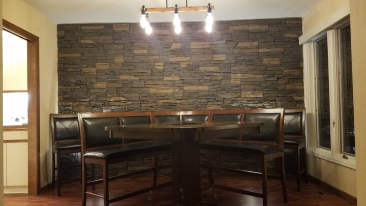 A dining room accent wall project completed with our Stratford Stacked Stone.