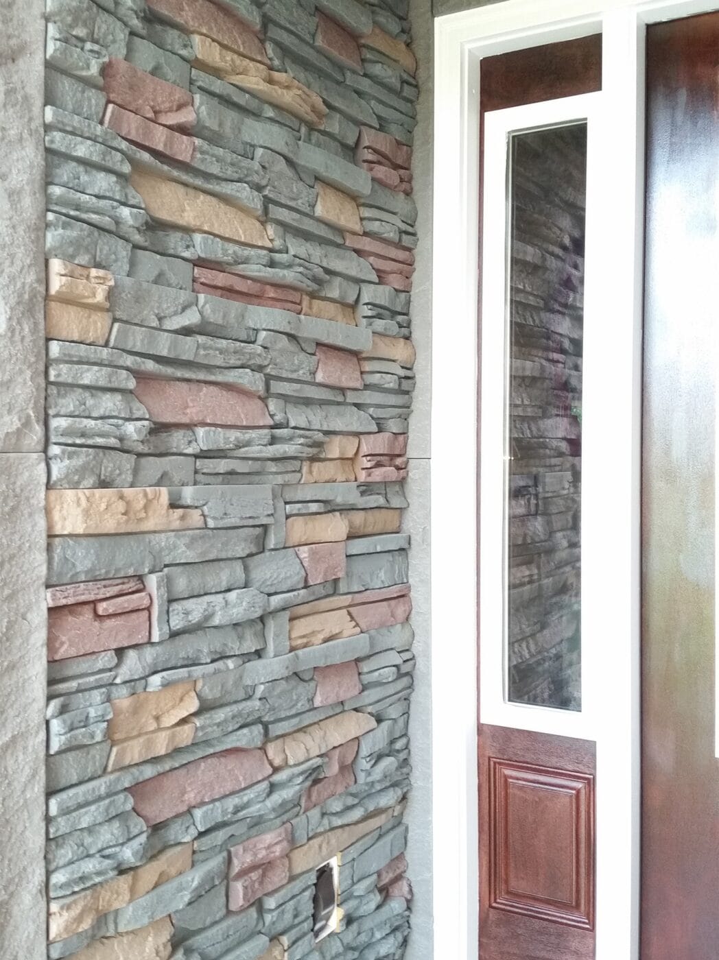 Exterior designs using Keystone Stacked Stone paneling for walls from Lowes.