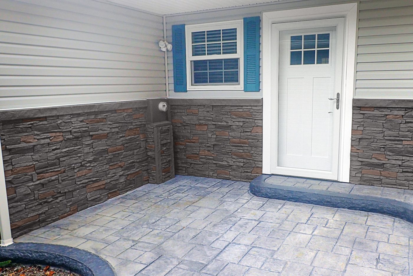 A DIY front entry wainscoting project designed using our Custom Color Stacked Stone panels.