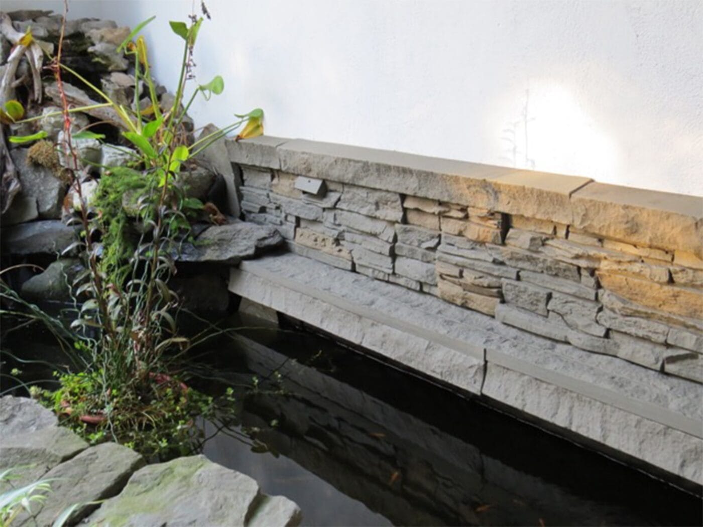 How to build a koi pond design using GenStone's Custom Color Stacked Stone panels.