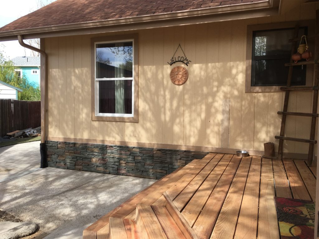 A home foundation project on a manufactured home using Stratford faux stone panels.