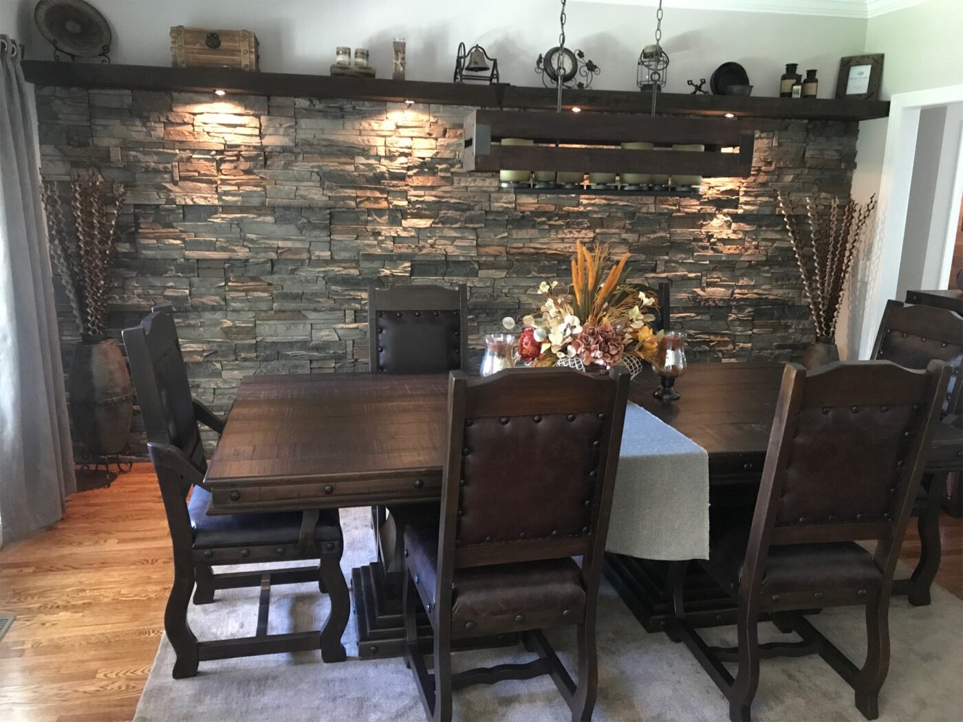 A dining room interior accent wall project completed with Kenai Stacked Stone panels.