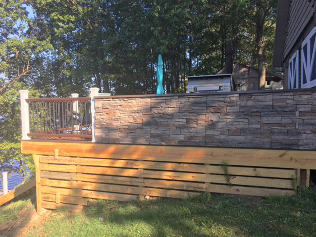 A DIY BBQ grill area designed using our Kenai Stacked Stone panels.