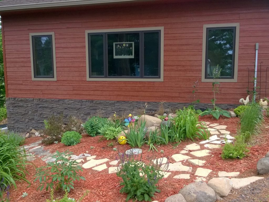 A DIY modern house exterior project completed using Stratford Stacked Stone panels.