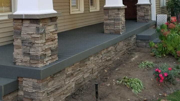 The rock siding on the entry of this home that used our Kenai Stacked Stone panels.