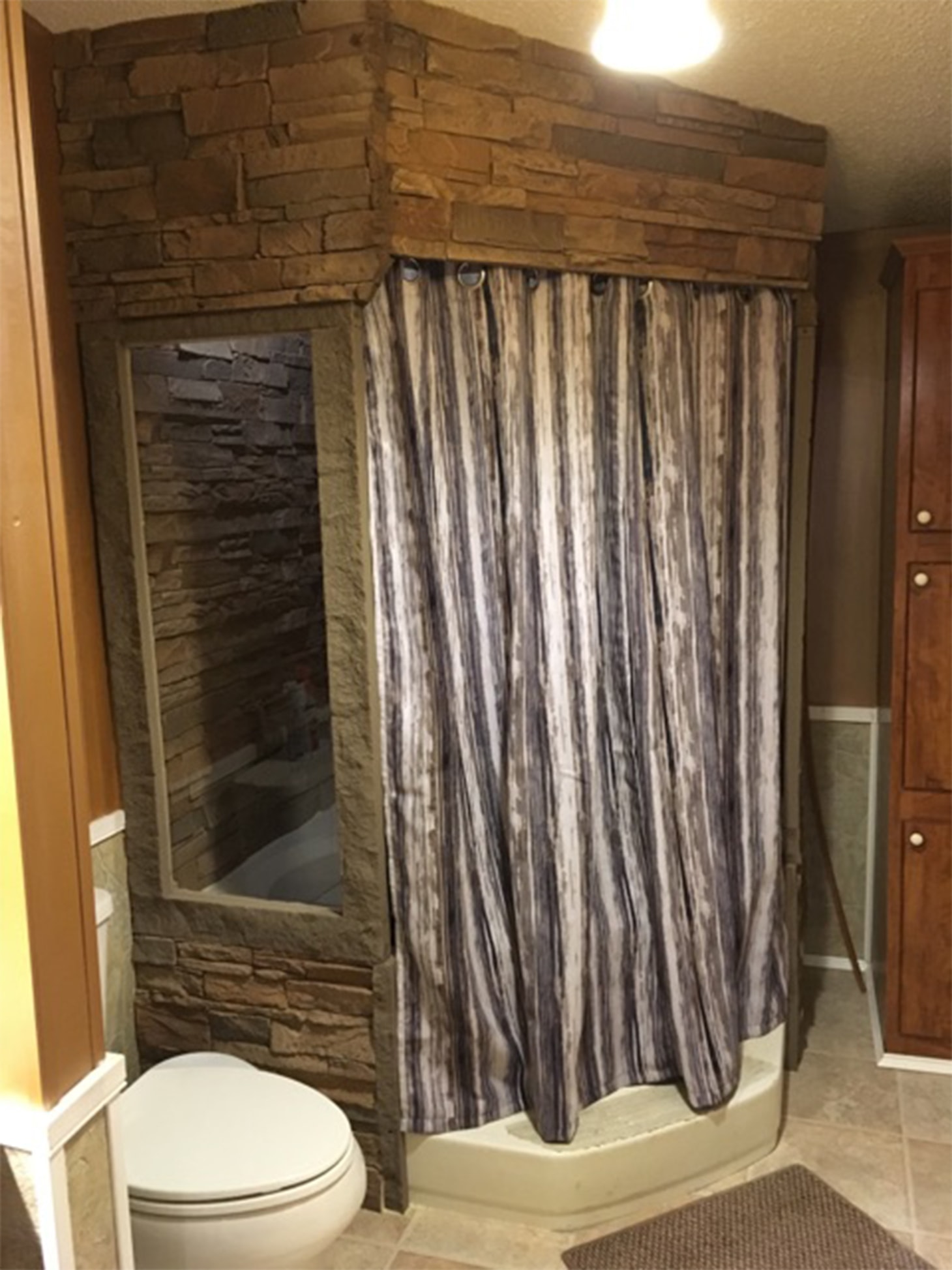 Stacked Stone Shower with Curtain