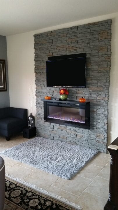 A DIY TV wall design that uses our Coffee Stacked Stone panels.