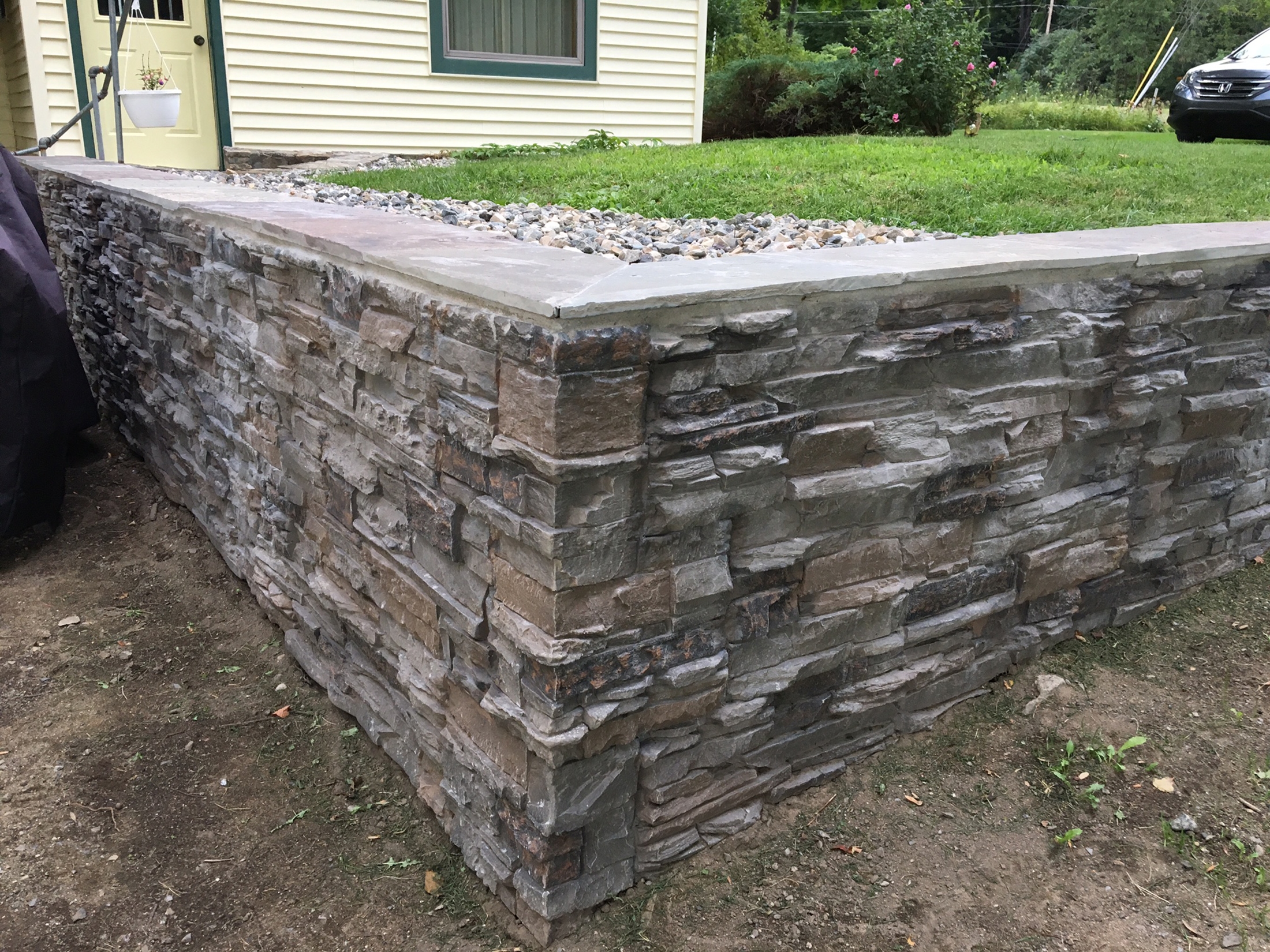 Rock Retaining Wall Cheapest Way To Build A Retaining Wall Genstone