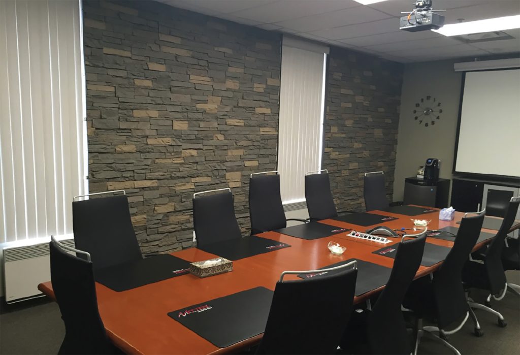 Stacked Stone Accent Walls in Conference Room