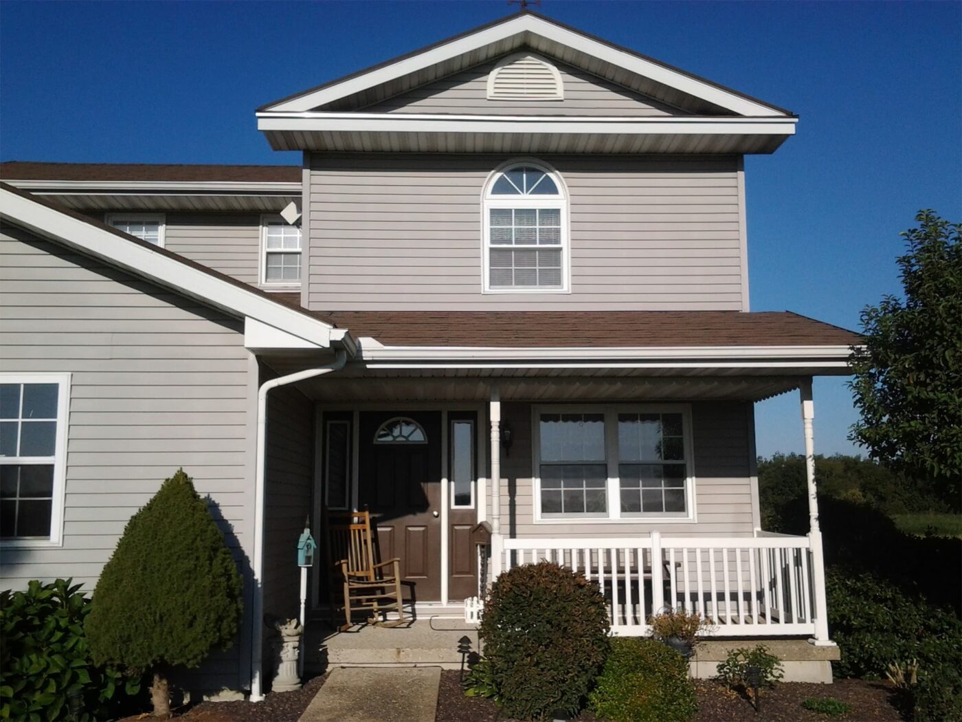 House Before Stacked Stone Wall