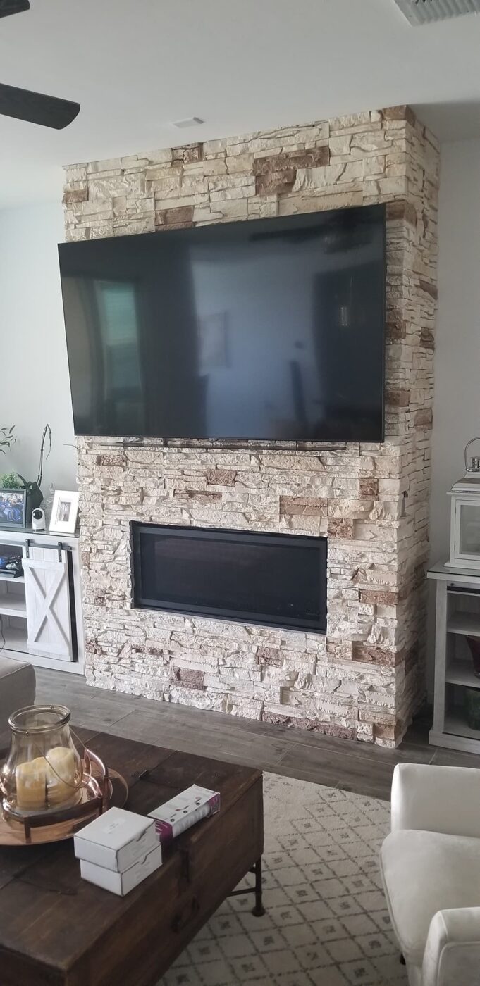 diy fireplace wall, faux stone TV wall