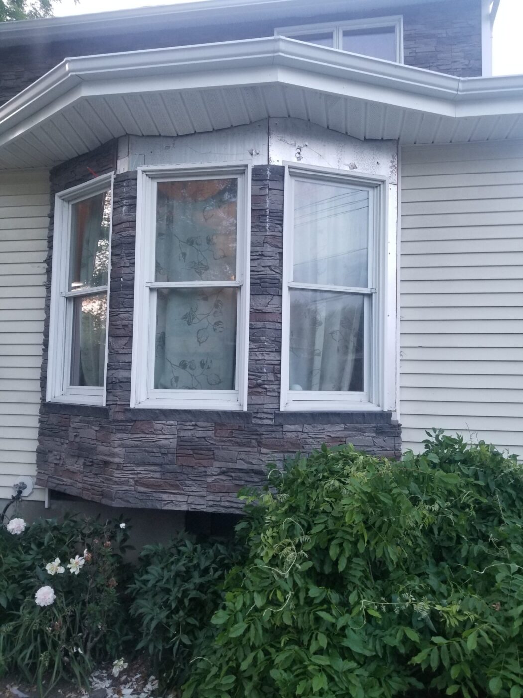 Keystone faux stone bay window