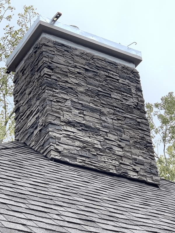 Kenai DIY stacked stone chimney