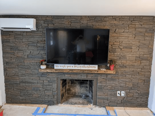 Kenai stone veneer TV wall and fireplace