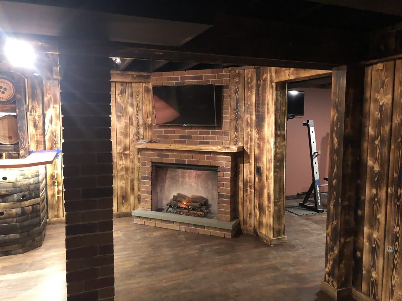 Basement brick veneer fireplace