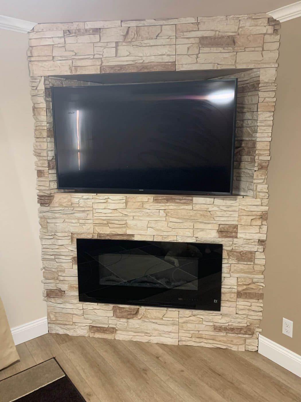 Vanilla Bean fireplace design with tv above
