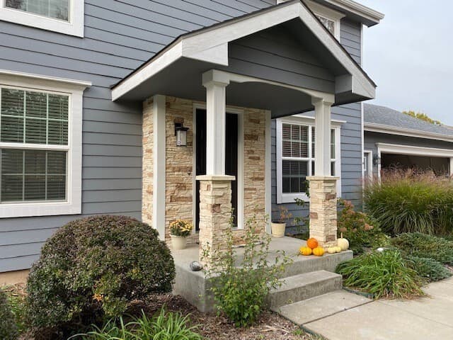 Vanilla Bean stone veneer front porch pillars