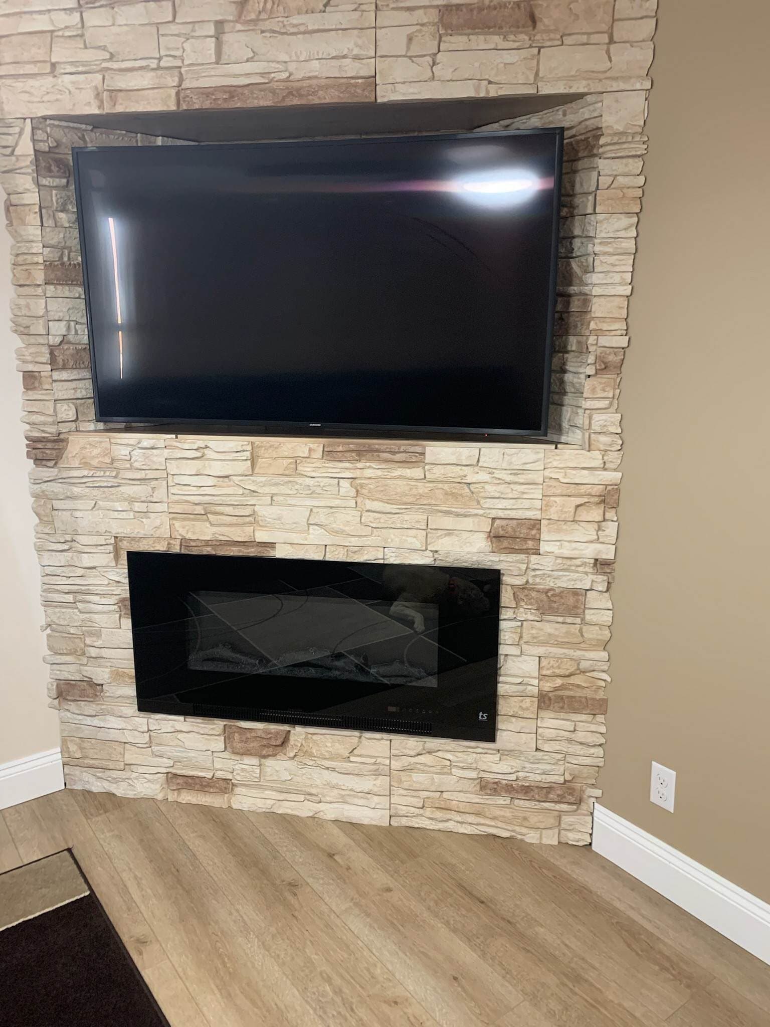 fireplace design with tv above