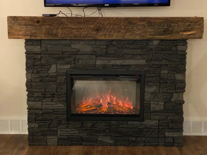 Iron Ore dark faux stone fireplace design