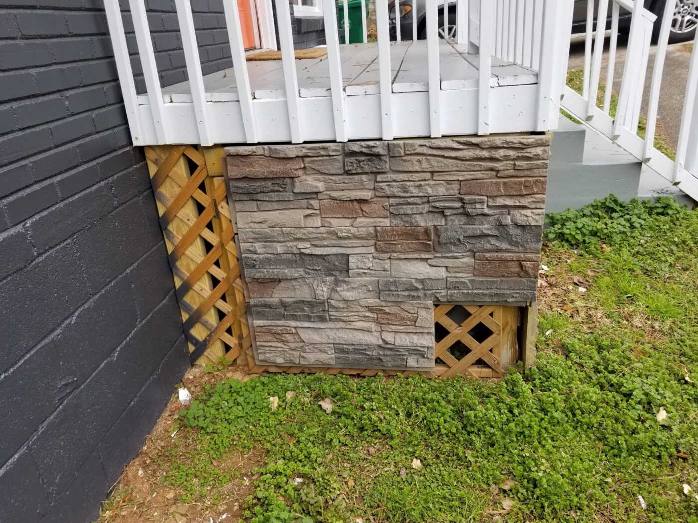 Kenai faux stone over lattice