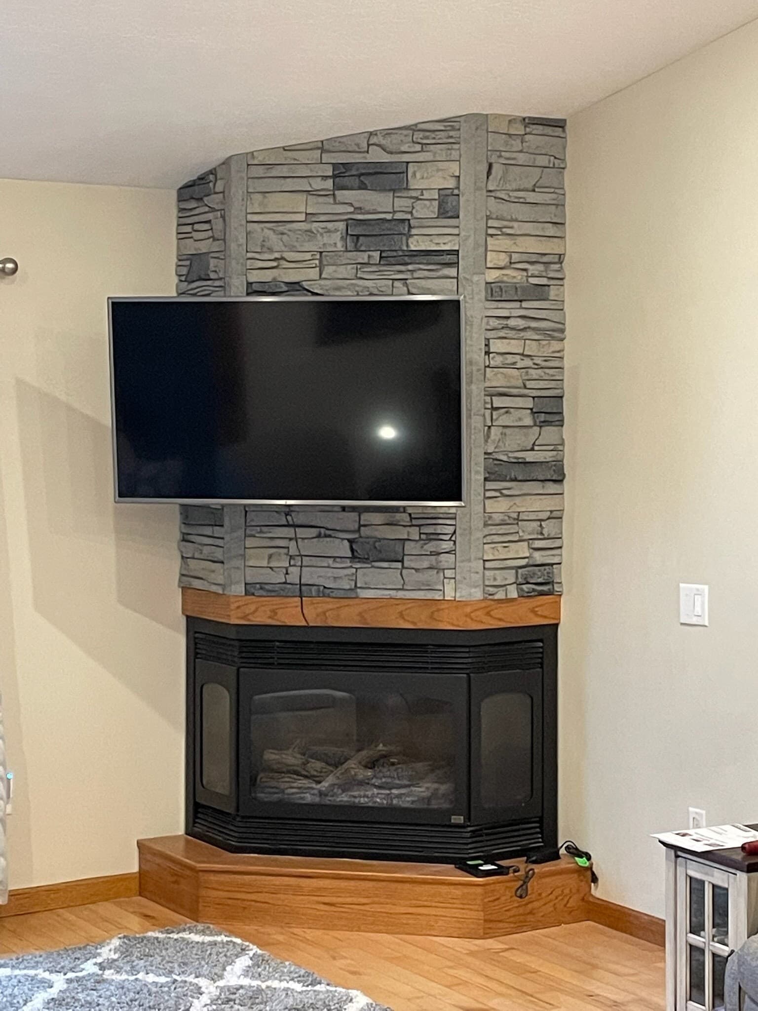 After Northern Slate electric fireplace TV wall