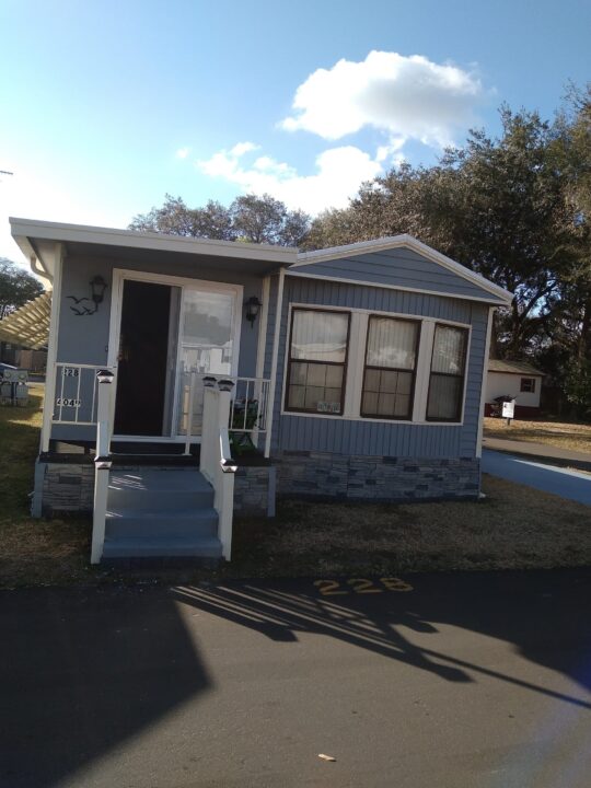 A DIY mobile home skirting project using Northern Slate faux stone panels.