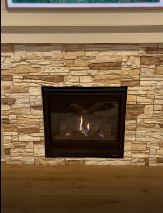 Vanilla Bean Stacked Stone electric fireplace surround