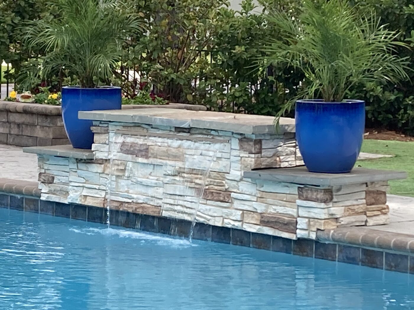 Vanilla Bean stone veneer pool fountain