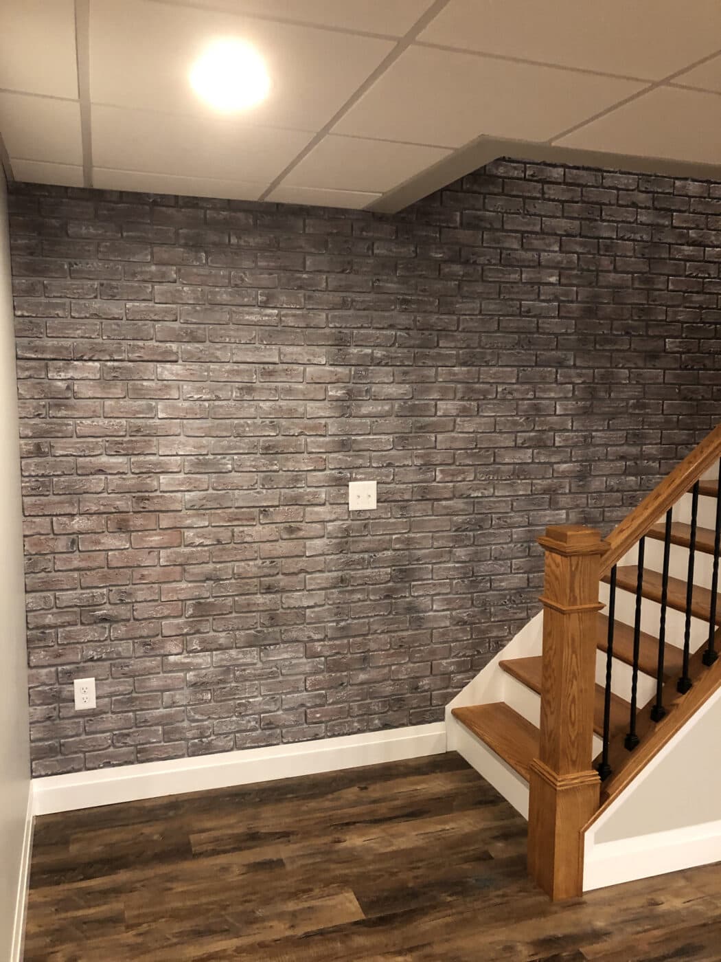 Chicago brick veneer staircase accent wall