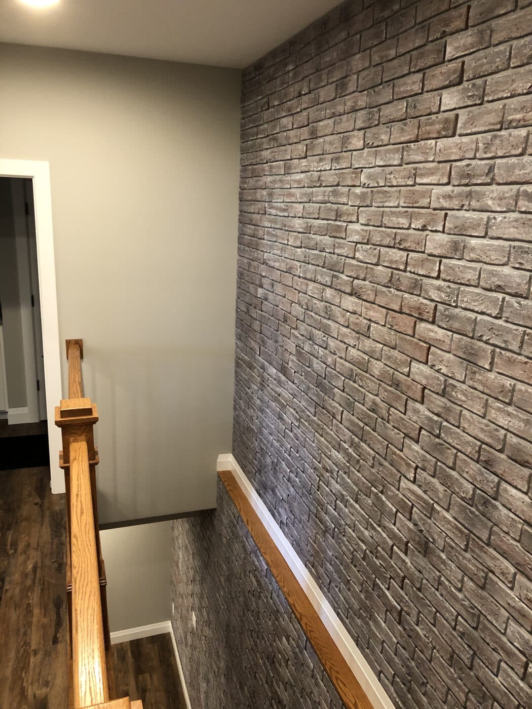 GenStone Chicago brick veneer staircase accent wall