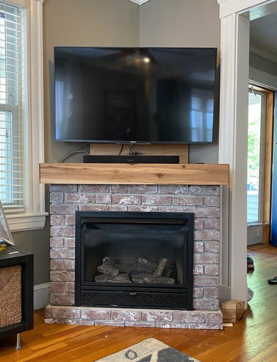 DIY Chicago brick fireplace surround