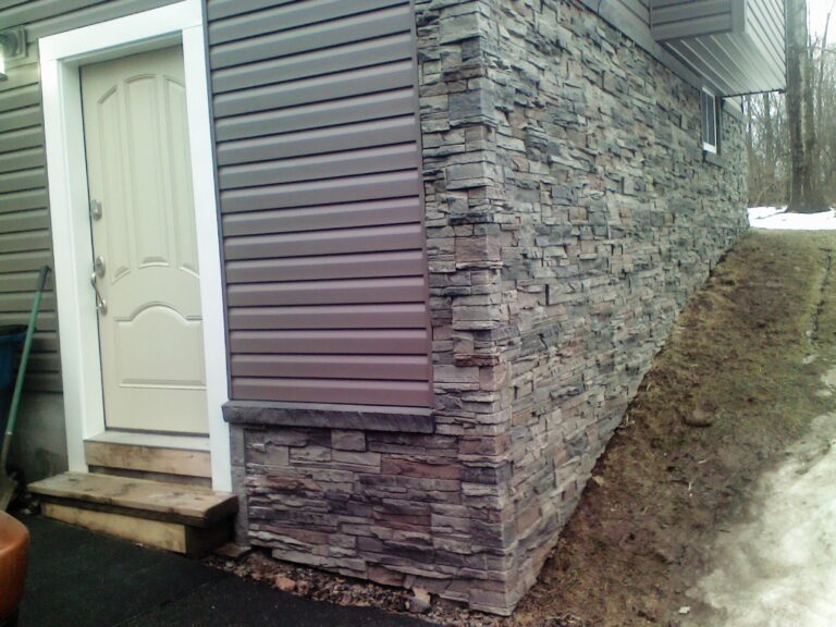 A foundation cover up project idea that uses our Kenai faux stone panels.