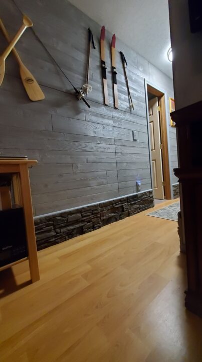 A hallway skirting project using Kenai Faux Stone panels.