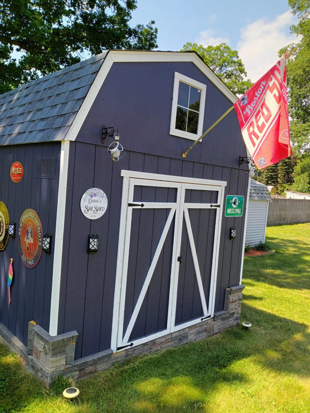 A she shed skirting project using Kenai faux stone panels.