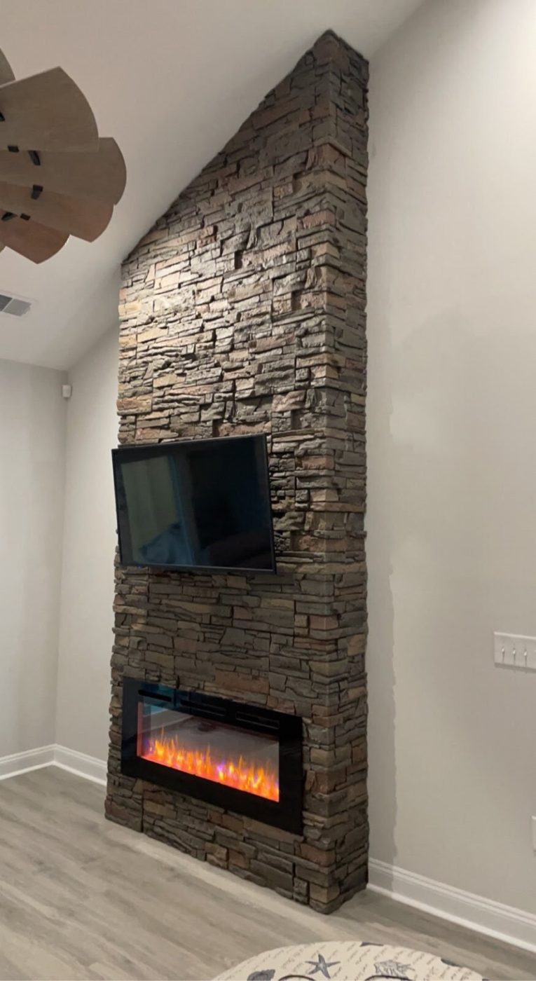 Faux Stone Asymmetrical Fireplace Design