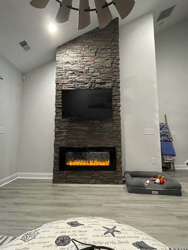 Faux Stone Asymmetrical Fireplace