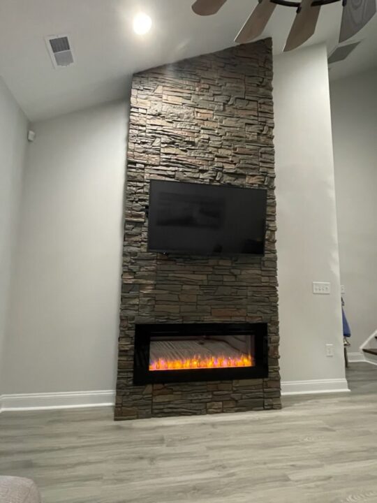 Stratford Faux Stone Asymmetrical Fireplace Design