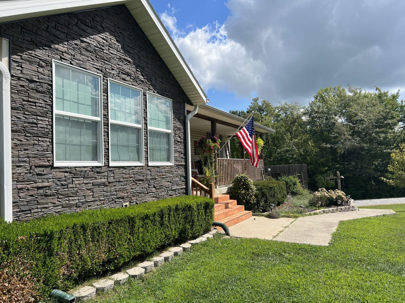 DIY faux stone siding transformation