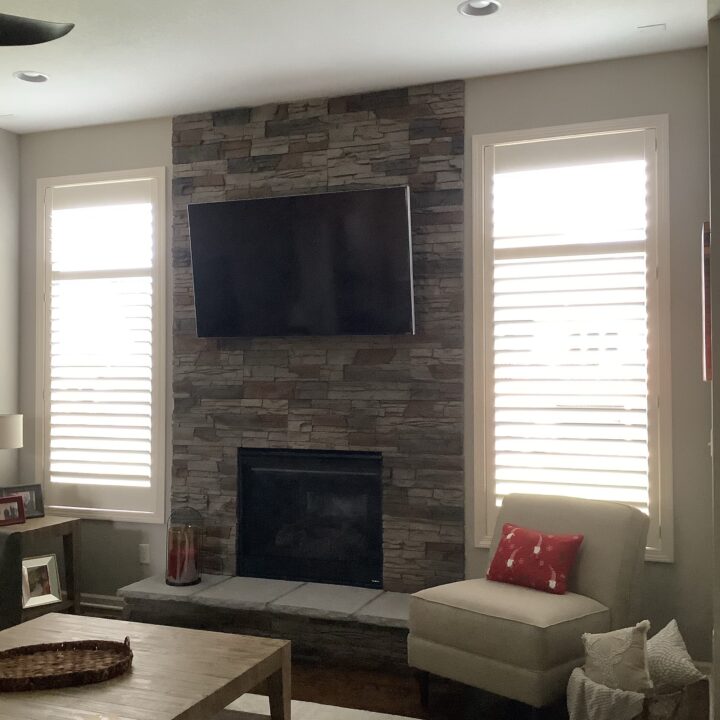 Kenai Stacked Stone Fireplace Under TV Design