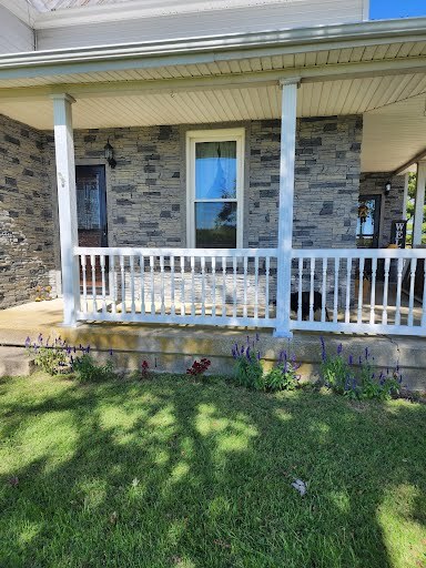 After Northern Slate Faux Stone Duplex Front Porch