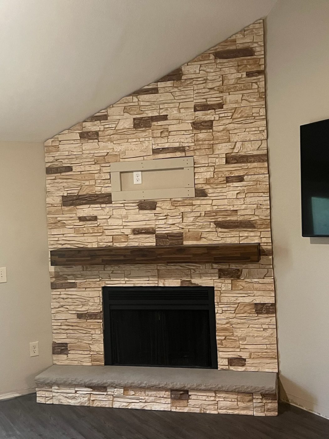 After Vanilla Bean Stacked Stone Classic Fireplace Design