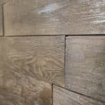 Bourbon Barrel Faux Wood Wall Panels on Wall