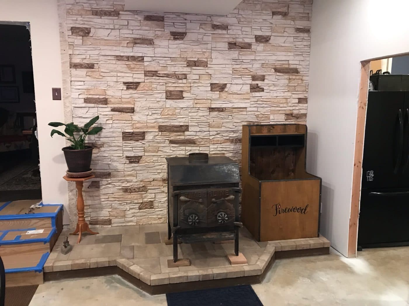 After Vanilla Bean Stacked Stone Wood Stove Accent Wall