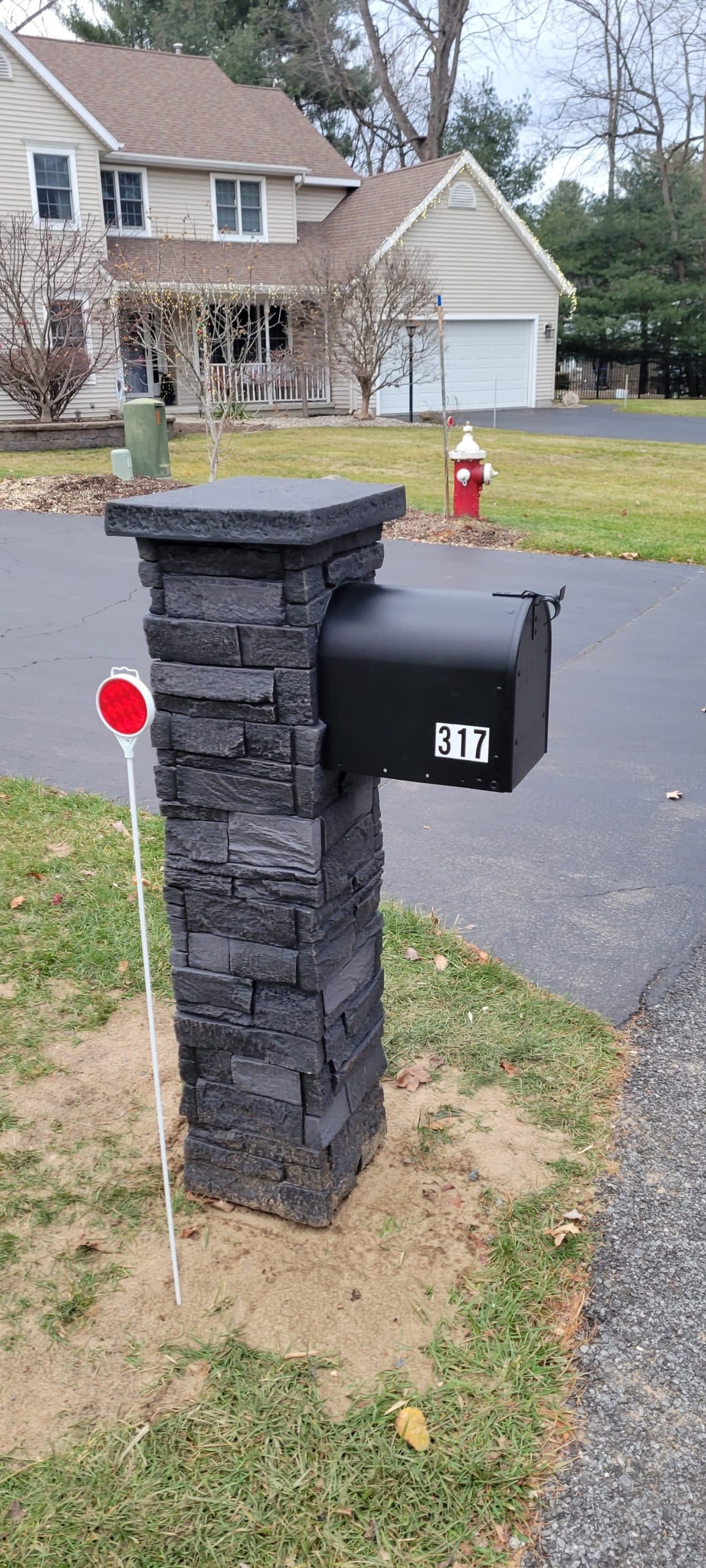 James' Iron Ore Stone Veneer Mailbox Pillar