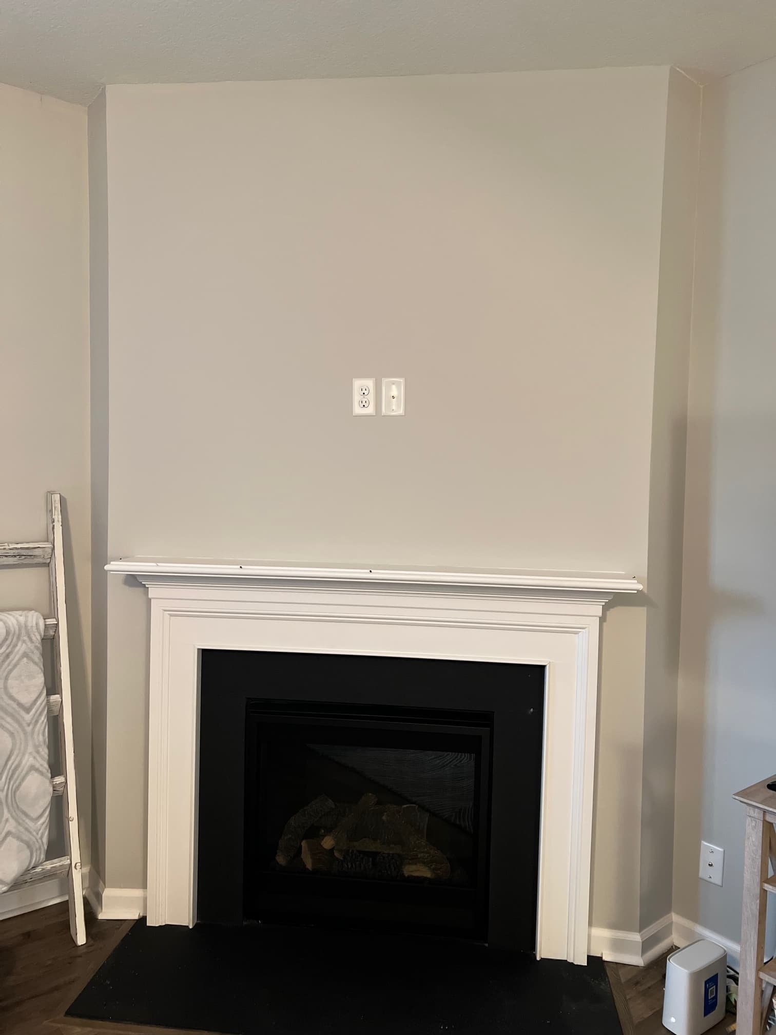 Before using Arctic Smoke Stacked Stone on this corner fireplace.
