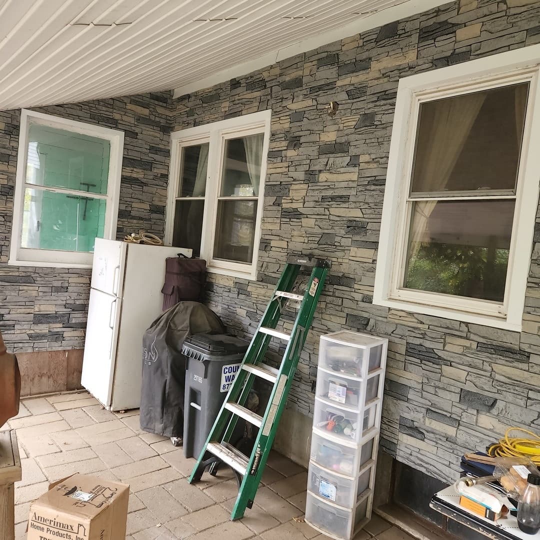 A DIY patio siding project using Northern Slate faux stone.