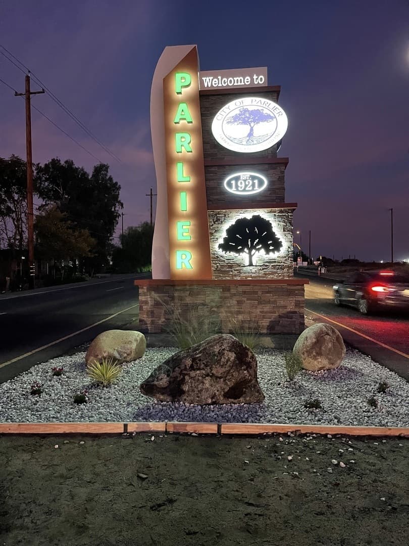 Desert Sunrise Faux Stone City Welcome Sign