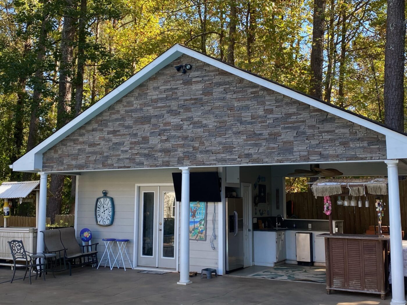 An exterior overhang accent wall using our Kenai faux stone.